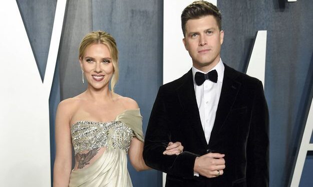 Actor Scarlett Johansson, left, and fiancé Colin Jost arrive at the Vanity Fair Oscar Party on Sunday, Feb. 9, 2020, in Beverly Hills, Calif. (Photo by Evan Agostini/Invision/AP)/INVW/20043790076815/020920126590, 21334631,/2002122301