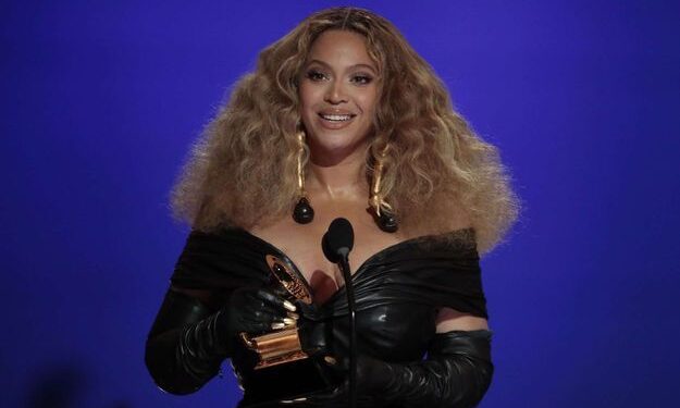 Mandatory Credit: Photo by Robert Gauthier/Los Angeles Times/Shutterstock (11799945co) Los Angeles, CA, Sunday, March 14, 2021 - Beyonce makes History with the Best E&B Performance winning 28 Grammys, more that any female or male performer, accepts the award for Best R&B Performance at the 63rd Grammy Award outside Staples Center. (Robert Gauthier/Los Angeles Times) 63rd Grammy Awards at Staples Center, La Convention Center, Los Angeles, California, United States - 10 Mar 2021/shutterstock_editorial_63rd_Grammy_Awards_at_Staples_Ce_11799945CO//2103150415