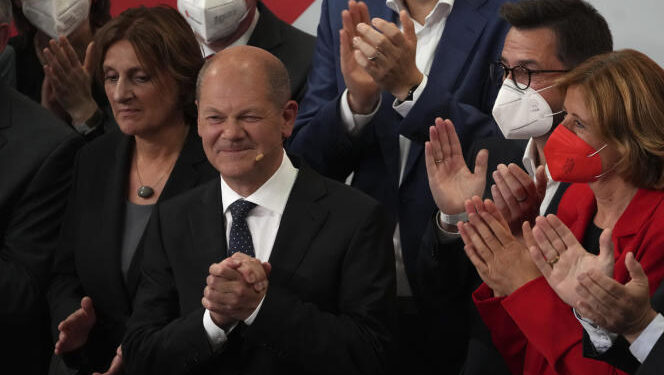 Olaf Scholz, Finance Minister and SPD candidate for Chancellor after addressing his supporters after German parliament election at the Social Democratic Party, SPD, headquarters in Berlin, Sunday, Sept. 26, 2021. (AP Photo/Michael Sohn)
