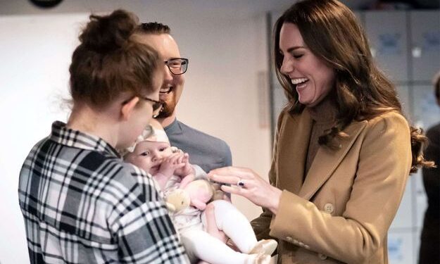 Mandatory Credit: Photo by Danny Lawson/WPA Pool/Shutterstock (12769103l) Catherine Duchess of Cambridge meets Trudi and Alastair Barrie and their daughter Anastasia during a visit to charity, Church on the Street, in Burnley, Lancashire, where she met with volunteers and staff as well as a number of service users to hear about their experiences first-hand. Prince William and Catherine, Duchess of Cambridge, Clitheroe, UK - 20 Jan 2022/shutterstock_editorial_Prince_William_and_Catherine_D_12769103l//2201202232