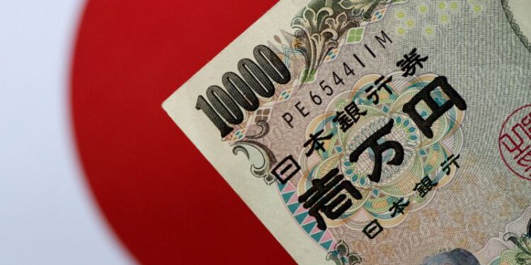 FILE PHOTO: A Japan Yen note is seen in this illustration photo taken June 1, 2017. REUTERS/Thomas White/Illustration