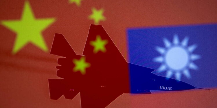 FILE PHOTO: Chinese and Taiwanese national flags are displayed alongside a military airplane in this illustration taken April 9, 2021. REUTERS/Dado Ruvic/Illustration/File Photo - RC2C1Q9Z17AF
