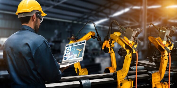 Smart industry robot arms for digital factory production technology showing automation manufacturing process of the Industry 4.0 or 4th industrial revolution and IOT software to control operation .