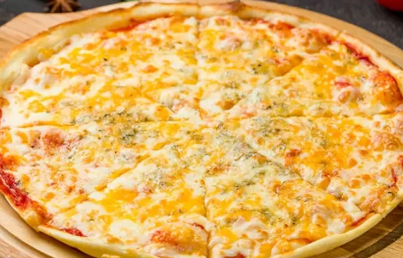 Pizza aux 4 fromages 2 - Le Progrès Egyptien Pizza aux 4 fromages 1 - Le Progrès Egyptien