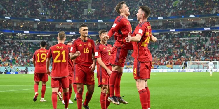Spain's midfielder #09 Gavi (2nd R) celebrates scoring his team's fifth goal during the Qatar 2022 World Cup Group E football match between Spain and Costa Rica at the Al-Thumama Stadium in Doha on November 23, 2022.   (Photo by Glyn KIRK / AFP)