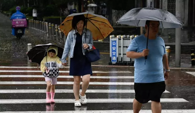 Pékin affronte les pluies torrentielles du typhon Doksuri 2 - Le Progrès Egyptien Pékin affronte les pluies torrentielles du typhon Doksuri 1 - Le Progrès Egyptien