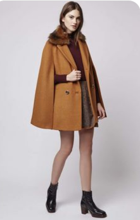 Le manteau cape : Une touche de chic à tous vos looks 6 - Le Progrès Egyptien Le manteau cape : Une touche de chic à tous vos looks 5 - Le Progrès Egyptien
