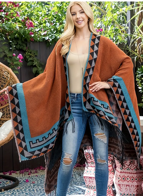 Le manteau cape : Une touche de chic à tous vos looks 8 - Le Progrès Egyptien Le manteau cape : Une touche de chic à tous vos looks 7 - Le Progrès Egyptien