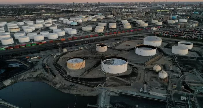 FILE PHOTO: Storage tanks for crude oil, gasoline, diesel, and other refined petroleum products are seen at the Kinder Morgan Terminal, viewed from the Phillips 66 Company's Los Angeles Refinery in Carson, California, U.S., March 11, 2022. Picture taken March 11, 2022. Picture taken with a drone. REUTERS/Bing Guan/File Photo
